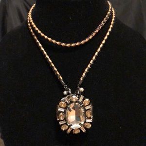 Leather necklace with jeweled pendant
